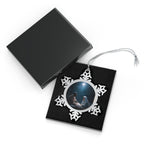 Snowflake Christmas Ornament featuring Mary, Joseph and baby Jesus beneath the Christmas star in a classic Nativity scene.