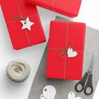 Christmas Wrapping Paper featuring solid cheer red gift wrap made to coordinate with holiday decorations.