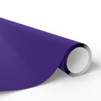 Christmas Wrapping Paper featuring solid nutcracker purple gift wrap made to coordinate with holiday decorations.