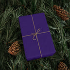Christmas Wrapping Paper featuring solid nutcracker purple gift wrap made to coordinate with holiday decorations.