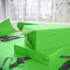 Christmas Wrapping Paper featuring solid holiday meanie green gift wrap made to coordinate with holiday decorations.
