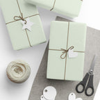 Christmas Wrapping Paper featuring solid mint green gift wrap made to coordinate with holiday decorations.
