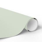 Christmas Wrapping Paper featuring solid mint green gift wrap made to coordinate with holiday decorations.