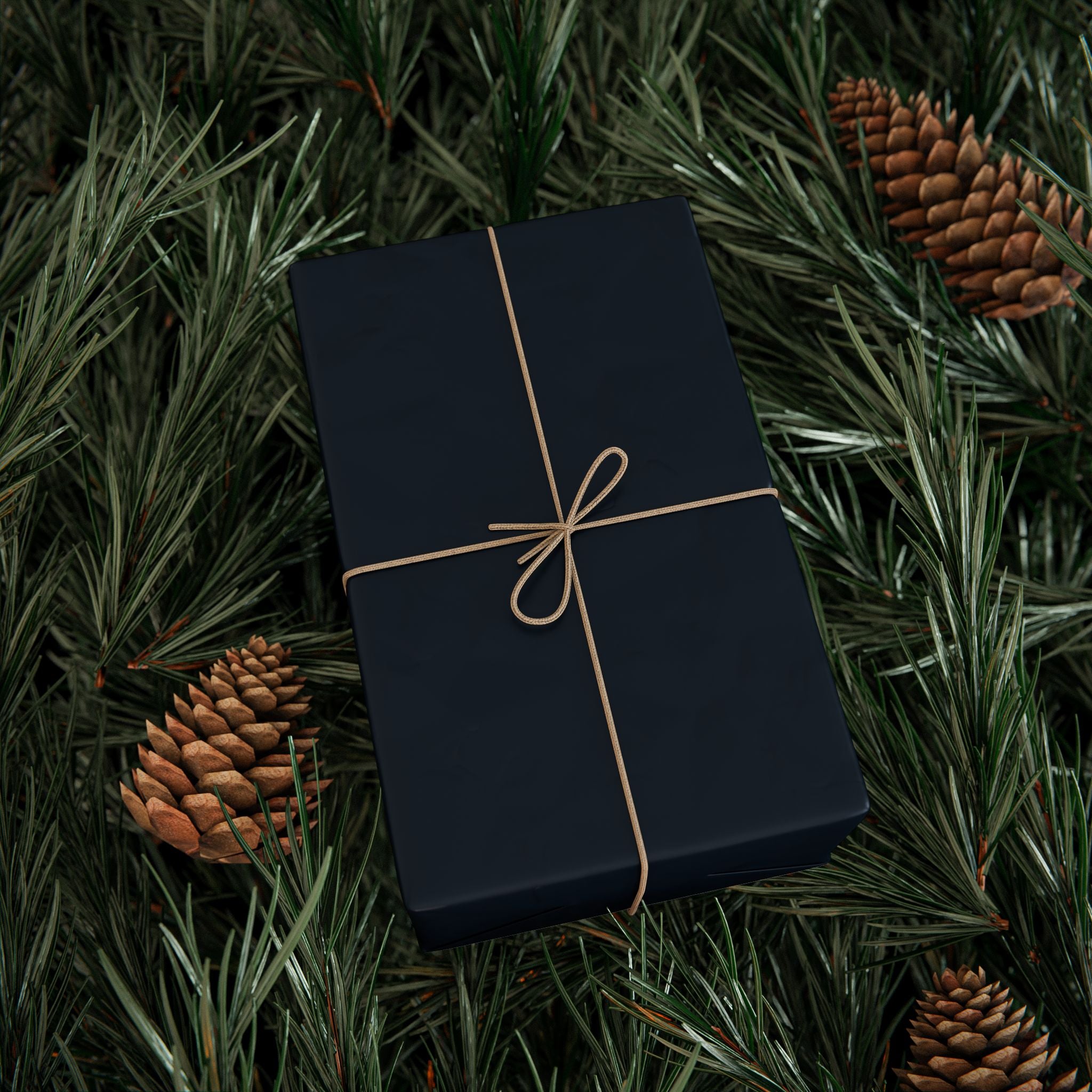 Christmas Wrapping Paper featuring blue angels, ornaments, bows and stars on a deep midnight background.