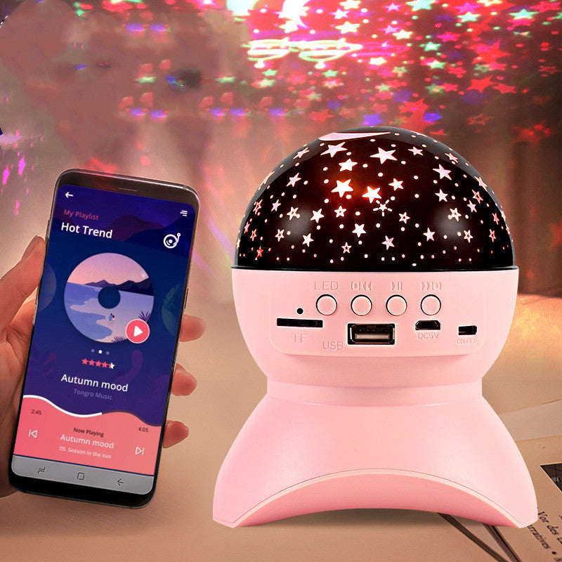 Christmas Light Projector featuring a star projector and Bluetooth speaker for cozy holiday lighting.