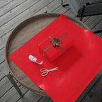 Christmas Wrapping Paper featuring solid cheer red gift wrap made to coordinate with holiday decorations.
