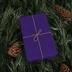 Christmas Wrapping Paper featuring solid nutcracker purple gift wrap made to coordinate with holiday decorations.