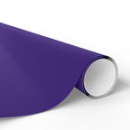 Christmas Wrapping Paper featuring solid nutcracker purple gift wrap made to coordinate with holiday decorations.