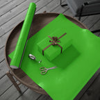 Christmas Wrapping Paper featuring solid holiday meanie green gift wrap made to coordinate with holiday decorations.