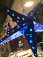 Christmas Ornament featuring an oversized Christmas star ornament for festive decorating.