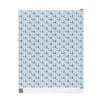 Christmas Wrapping Paper featuring blue angel artwork with soft winter holiday accents.