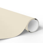 Christmas Wrapping Paper featuring solid cream gift wrap made to coordinate with holiday decorations.