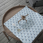 Christmas Wrapping Paper featuring blue angel artwork with soft winter holiday accents.