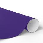 Christmas Wrapping Paper featuring solid nutcracker purple gift wrap made to coordinate with holiday decorations.