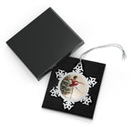 Snowflake Christmas Ornament featuring a graceful young Black ballerina dancing beside a decorated Christmas tree.