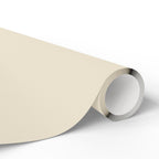 Christmas Wrapping Paper featuring solid cream gift wrap made to coordinate with holiday decorations.