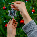 Snowflake Christmas Ornament featuring Mary, Joseph and baby Jesus beneath the Christmas star in a classic Nativity scene.