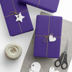 Christmas Wrapping Paper featuring solid nutcracker purple gift wrap made to coordinate with holiday decorations.