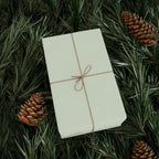 Christmas Wrapping Paper featuring solid mint green gift wrap made to coordinate with holiday decorations.