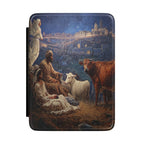 Kindle Case featuring the Holy Family protected beneath an angel in a dramatic Nativity-inspired scene.
