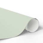 Christmas Wrapping Paper featuring solid mint green gift wrap made to coordinate with holiday decorations.