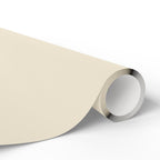 Christmas Wrapping Paper featuring solid cream gift wrap made to coordinate with holiday decorations.