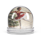 Christmas Snow Globe featuring a graceful young Black ballerina dancing beside a decorated Christmas tree.