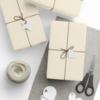Christmas Wrapping Paper featuring solid cream gift wrap made to coordinate with holiday decorations.