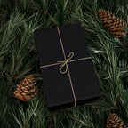 Christmas Wrapping Paper featuring solid midnight blue gift wrap made to coordinate with holiday decorations.