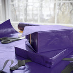 Christmas Wrapping Paper featuring solid nutcracker purple gift wrap made to coordinate with holiday decorations.