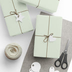 Christmas Wrapping Paper featuring solid mint green gift wrap made to coordinate with holiday decorations.
