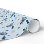 Christmas Wrapping Paper featuring blue angel artwork with soft winter holiday accents.