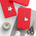 Christmas Wrapping Paper featuring solid cheer red gift wrap made to coordinate with holiday decorations.