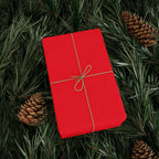 Christmas Wrapping Paper featuring solid cheer red gift wrap made to coordinate with holiday decorations.