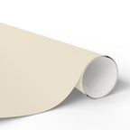 Christmas Wrapping Paper featuring solid cream gift wrap made to coordinate with holiday decorations.