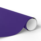 Christmas Wrapping Paper featuring solid nutcracker purple gift wrap made to coordinate with holiday decorations.