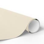 Christmas Wrapping Paper featuring solid cream gift wrap made to coordinate with holiday decorations.