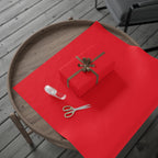 Christmas Wrapping Paper featuring solid cheer red gift wrap made to coordinate with holiday decorations.